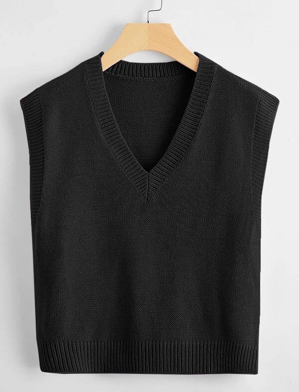 Black sweater vest — Solomon Heights Academy uniform